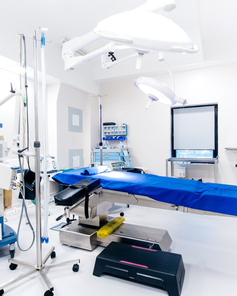 Hospital interior with operating surgery table,